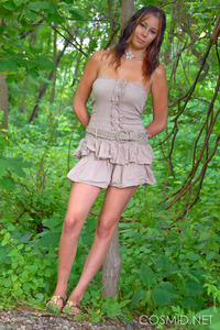 Busty girl posing outdoors