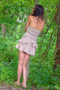 Busty girl posing outdoors