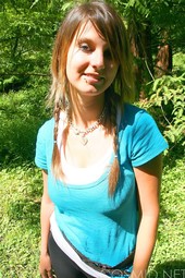 Busty teen brunette shows her boobs