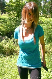 Busty teen brunette shows her boobs