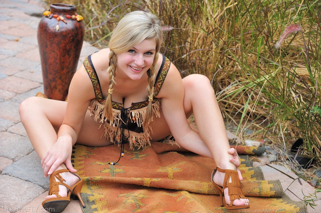 Danielle plays with her pussy outdoor 10