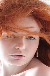 Redhead teen posing nude